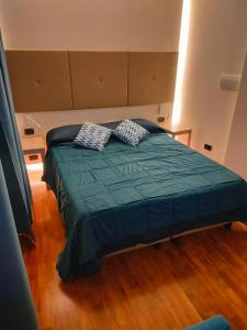 Postel nebo postele na pokoji v ubytování Locanda La Lucciola