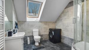 Koupelna v ubytování Apartmány Čtyřlístek + 37 fotografií