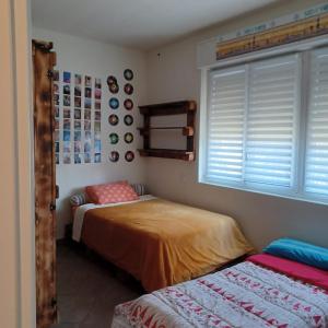A bed or beds in a room at trilocale nr 8