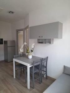 Kuchyň nebo kuchyňský kout v ubytování Casa al Corso Sant'Antioco (SU) + 3 fotografie