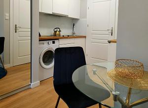 Kuchyňa alebo kuchynka v ubytovaní Hugo Star Apartments