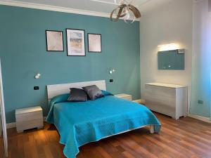 Ένα ή περισσότερα κρεβάτια σε δωμάτιο στο L'Aurora Guest House