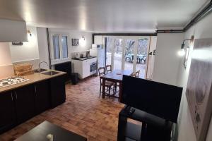 Η κουζίνα ή μικρή κουζίνα στο Logement base de loisirs +8 φωτογραφίες