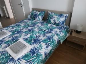 Postel nebo postele na pokoji v ubytování Apartman ROYAL GOLD