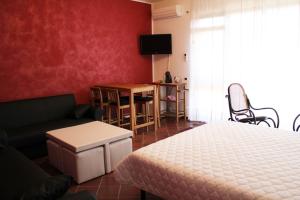 TV a/nebo společenská místnost v ubytování B&B Il Centralino