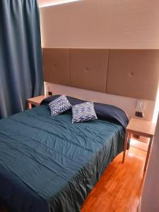 Postel nebo postele na pokoji v ubytování Locanda La Lucciola