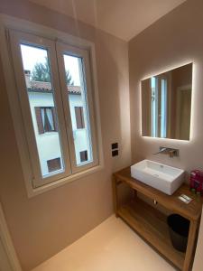 Voodi või voodid majutusasutuse Prato della Valle Apartments toas