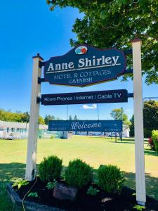 a sign for the entrance to anne smithy motel and certificates embassy at Anne Shirley Motel & Cottages in Cavendish