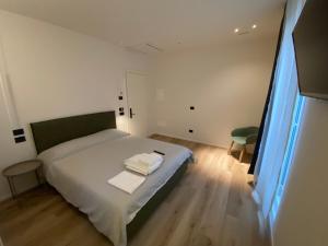 Voodi või voodid majutusasutuse Prato della Valle Apartments toas