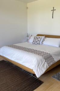Ένα ή περισσότερα κρεβάτια σε δωμάτιο στο Preciosa casa de descanso en Atlixco.