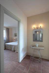 A bed or beds in a room at Agriturismo Piani Della Marina