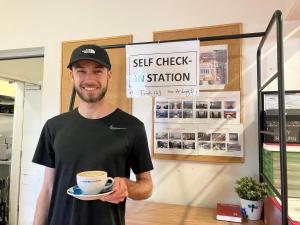 Certifikát, hodnocení, plakát nebo jiný dokument vystavený v ubytování Tomato Backpackers