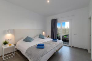 Postel nebo postele na pokoji v ubytování Villa Sibisse by Villa Plus + 13 fotografií