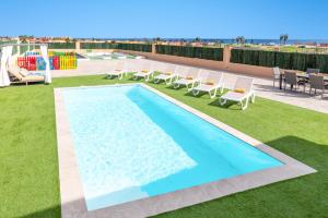 Bazén v ubytovaní Villa Ocean Paradise by Villa Plus alebo v jeho blízkosti