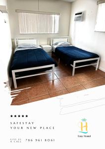 Postel nebo postele na pokoji v ubytování Easy Hostel