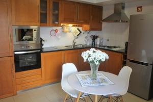 Kuchyň nebo kuchyňský kout v ubytování Lovely Home + 11 fotografií