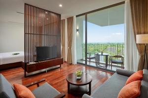 Μια τηλεόραση ή/και κέντρο ψυχαγωγίας στο Wyndham Grand Vedana Ninh Binh Resort