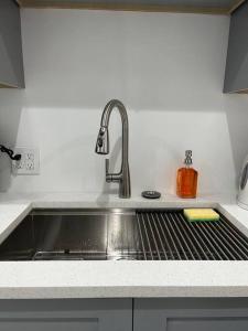 a kitchen counter with a sink and a sink at Adorable 2 bedroom with free street parking in Chicago