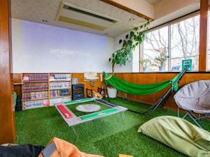 Area soggiorno di We Home Villa ～城ケ崎温泉～