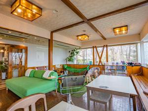 Area soggiorno di We Home Villa ～城ケ崎温泉～