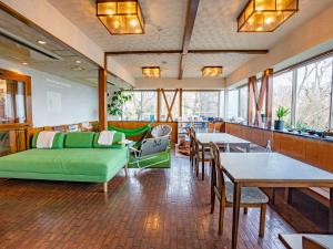 Area soggiorno di We Home Villa ～城ケ崎温泉～