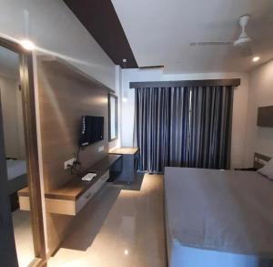 TV a/nebo společenská místnost v ubytování Central Abode Family Rooms
