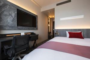 Postel nebo postele na pokoji v ubytování Hotel JAL City Haneda Tokyo