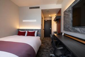 Postel nebo postele na pokoji v ubytování Hotel JAL City Haneda Tokyo