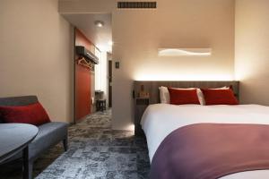 Postel nebo postele na pokoji v ubytování Hotel JAL City Haneda Tokyo
