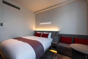 Postel nebo postele na pokoji v ubytování Hotel JAL City Haneda Tokyo