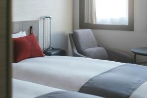 Postel nebo postele na pokoji v ubytování Hotel JAL City Haneda Tokyo