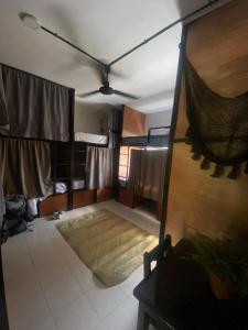 Voodi või voodid majutusasutuse Ariché Valladolid Hotel & Hostal toas