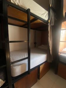 Voodi või voodid majutusasutuse Ariché Valladolid Hotel & Hostal toas