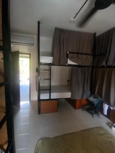 Voodi või voodid majutusasutuse Ariché Valladolid Hotel & Hostal toas