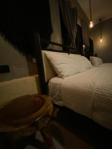 Voodi või voodid majutusasutuse Ariché Valladolid Hotel & Hostal toas