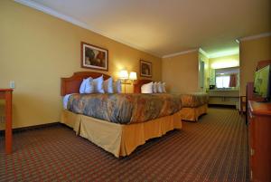 Postel nebo postele na pokoji v ubytování Americas Best Value Inn Killeen Ft Hood