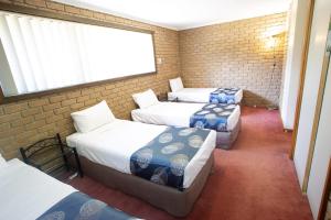 Goldfields Motel客房内的一张或多张床位