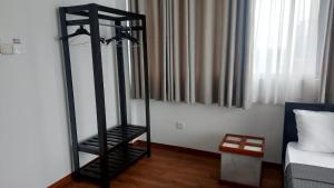 Postel nebo postele na pokoji v ubytování Jays Guest - Rajagiriya Colombo