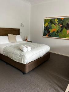Ένα ή περισσότερα κρεβάτια σε δωμάτιο στο Apartments At Glen Isla