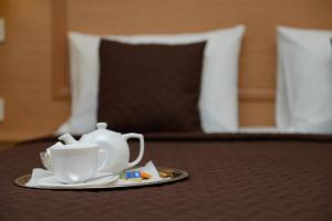 Postel nebo postele na pokoji v ubytování Dvoryanskiy Hotel