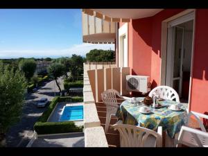 Fotografia z galérie ubytovania Red flat with shared pool and private parking v destinácii Porto Santa Margherita di Caorle