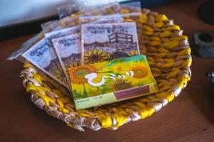 a basket filled with books on top of a table at Guest House Himawari - Vacation STAY 31394 in Mine