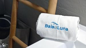 Postel nebo postele na pokoji v ubytování Baia di Luna