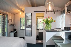 Kuchyň nebo kuchyňský kout v ubytování Tiny House Boatshed