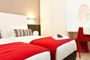 Postel nebo postele na pokoji v ubytování Hotel Centrale