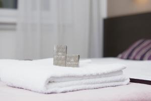 Postel nebo postele na pokoji v ubytování Hotel Centrale