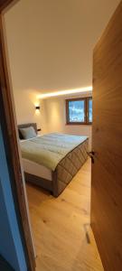 A bed or beds in a room at Appartement Waldzauber