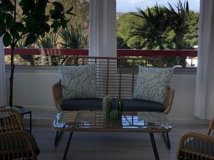 Khu vực ghế ngồi tại Appartement Le Plein Sud 85 m2 Plage 2 mn à pied