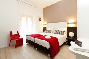 Postel nebo postele na pokoji v ubytování Hotel Centrale