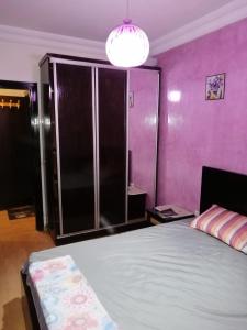 Postel nebo postele na pokoji v ubytování Mohammed V Airport Appartment